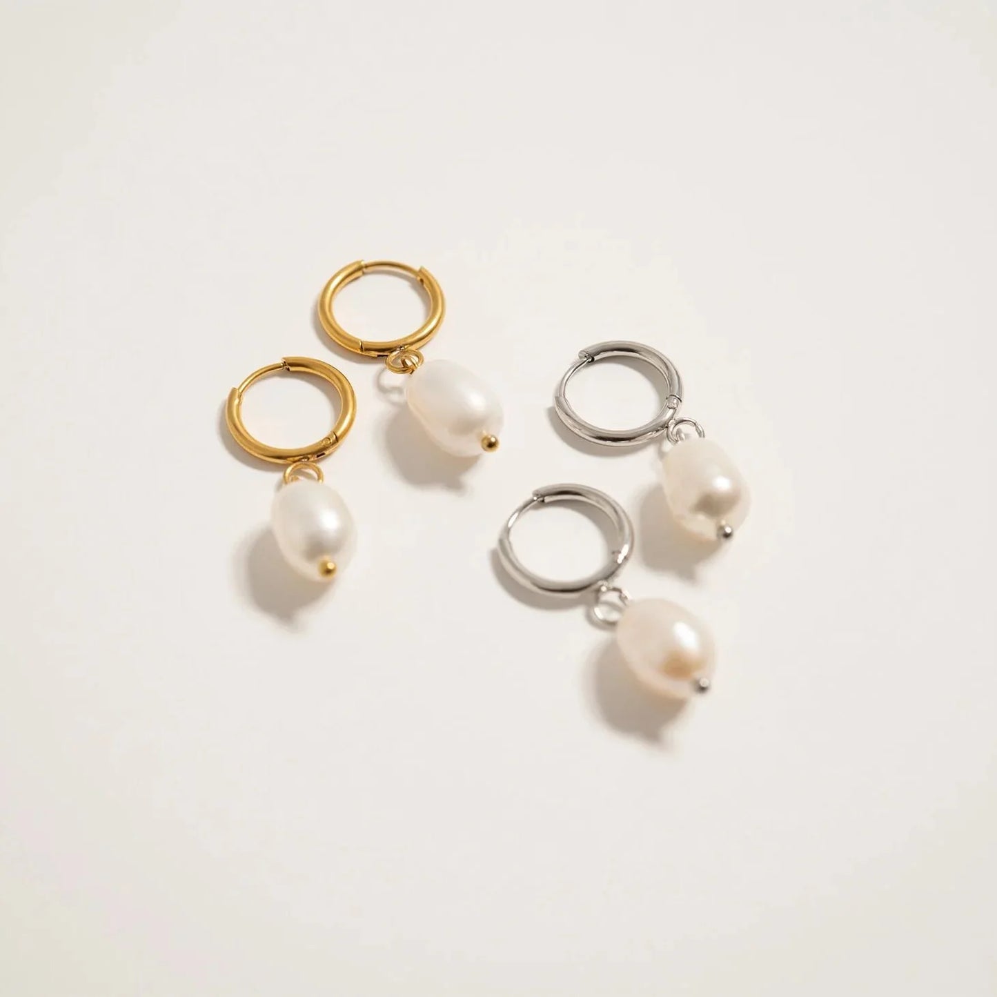The Solitary Pearl Huggie Earrings