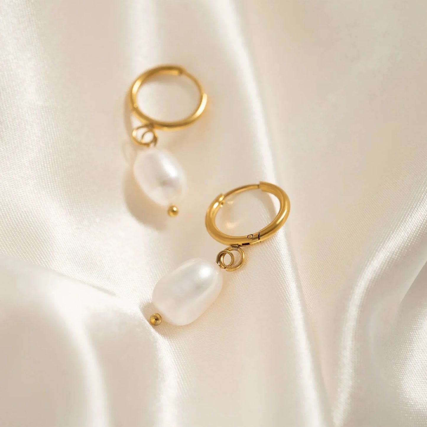The Solitary Pearl Huggie Earrings